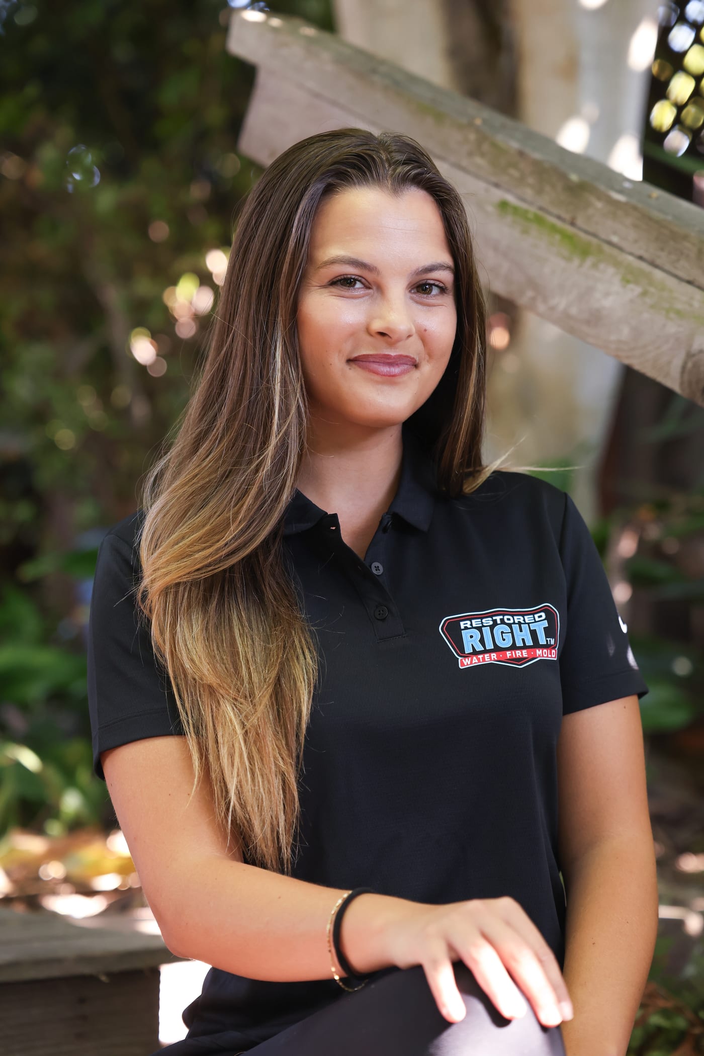 Restored Right team member in branded polo shirt